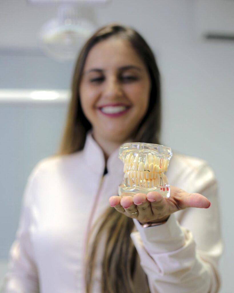 quanto tempo demora para fazer um implante dentario